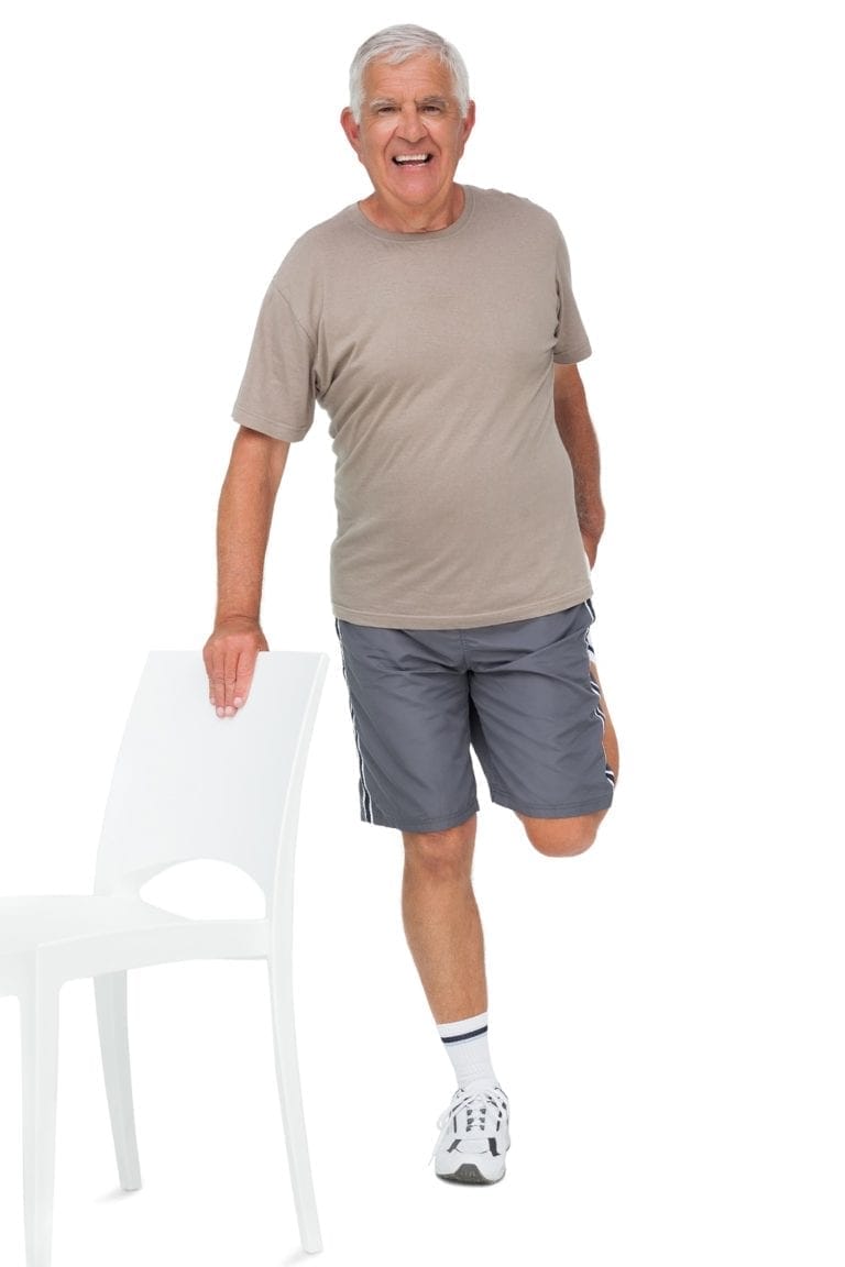 Full length portrait of a happy senior man stretching leg over w