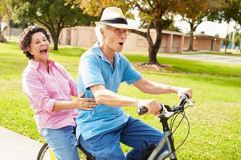 Couple enjoying a bike ride
