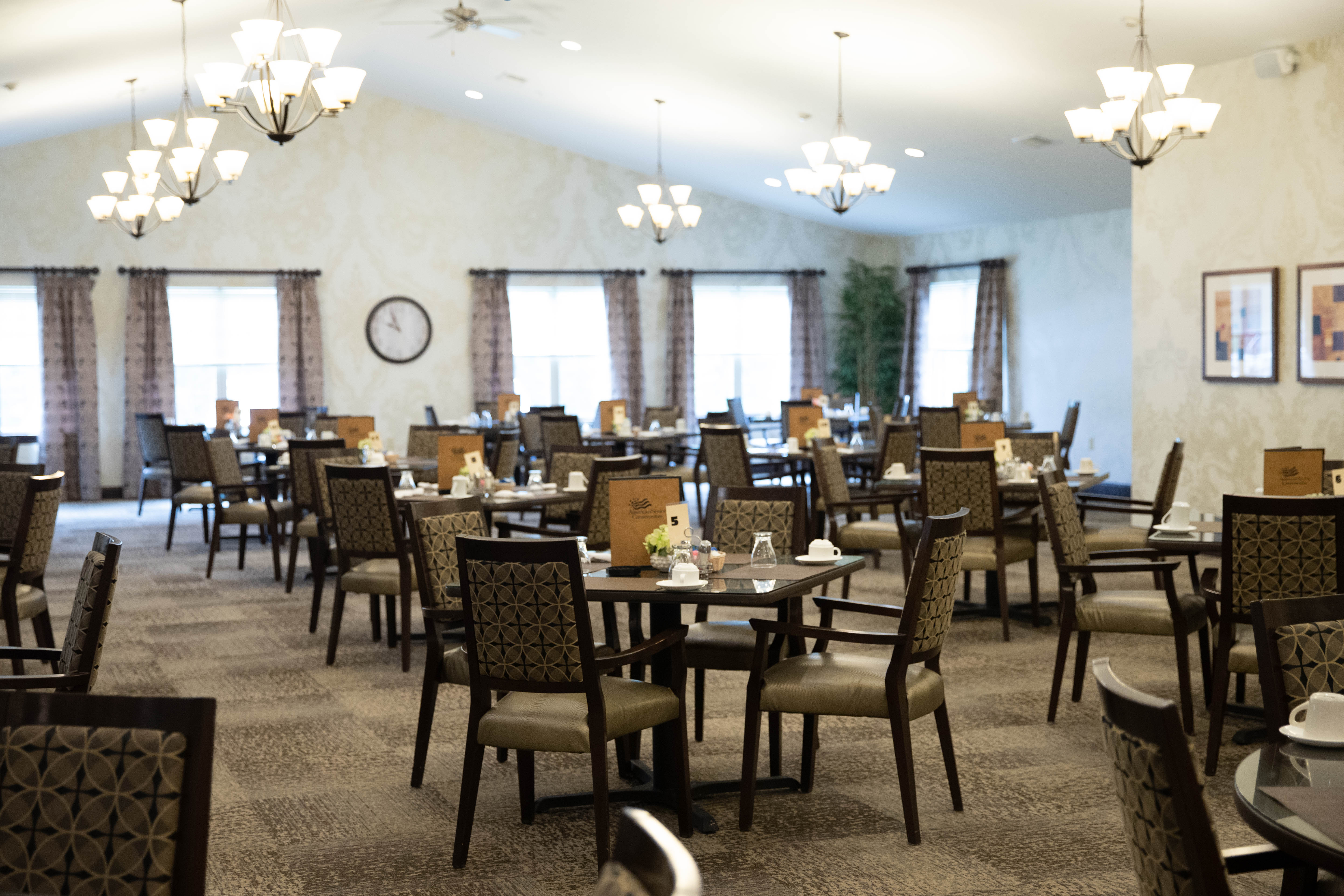 <span  class="uc_style_uc_tiles_grid_image_elementor_uc_items_attribute_title" style="color:#000000;">The dining room at the Aster Place Assisted Living Apartments. </span>