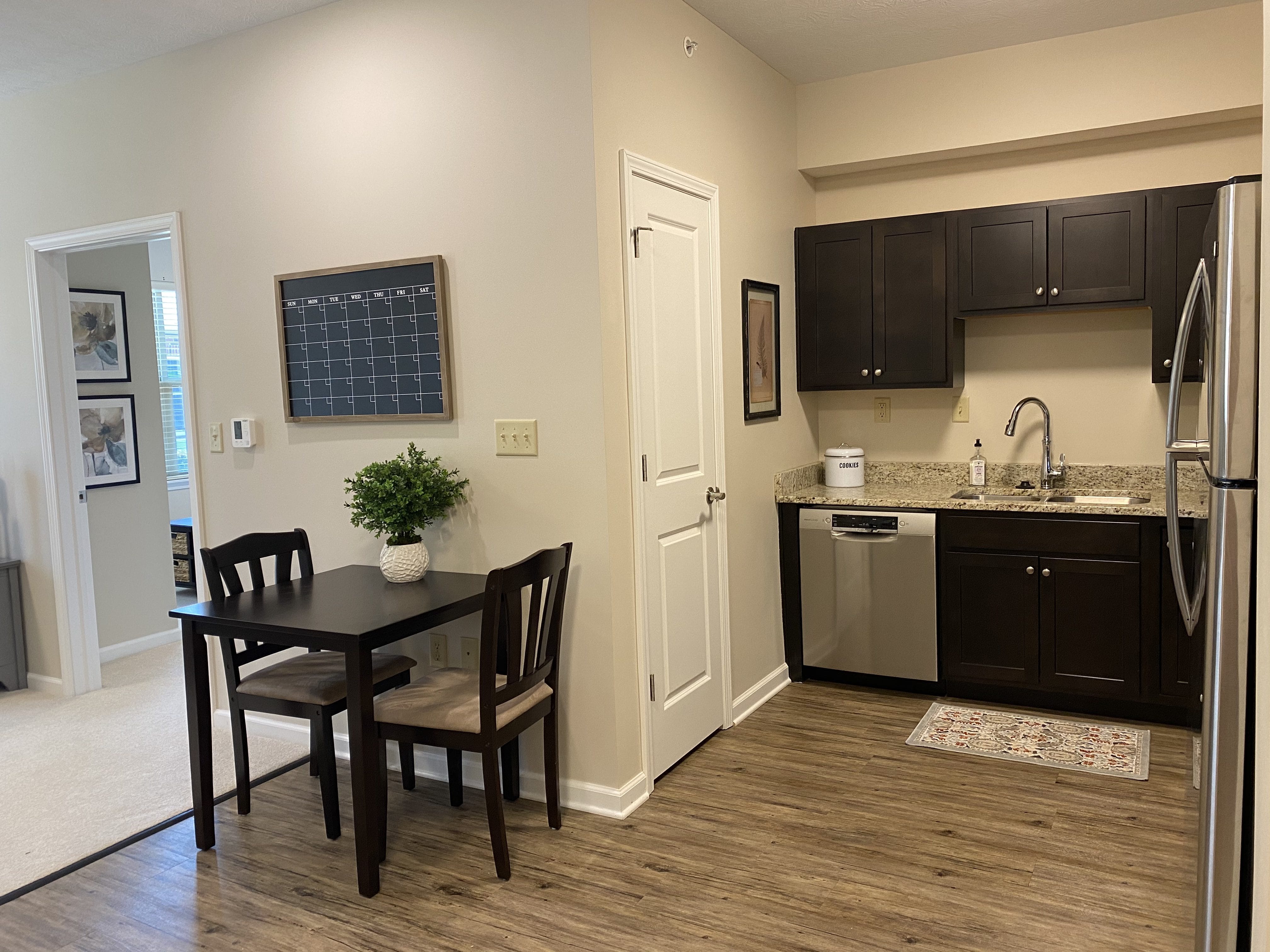 <span  class="uc_style_uc_tiles_grid_image_elementor_uc_items_attribute_title" style="color:#000000;">Kitchen and seating area in Aster Place Independent Living Apartments. </span>