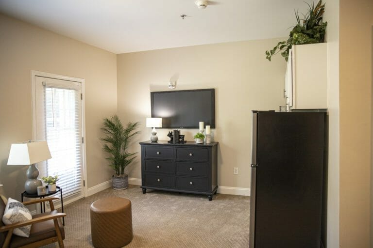 The Commons at Honey Creek assisted living studio bedroom.