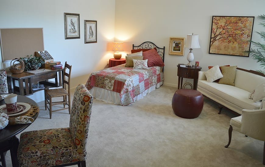 <span  class="uc_style_uc_tiles_grid_image_elementor_uc_items_attribute_title" style="color:#000000;">Allisonville Meadows Assisted Living apartment bedroom.</span>