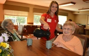 Coffee served to resident of Avalon Village