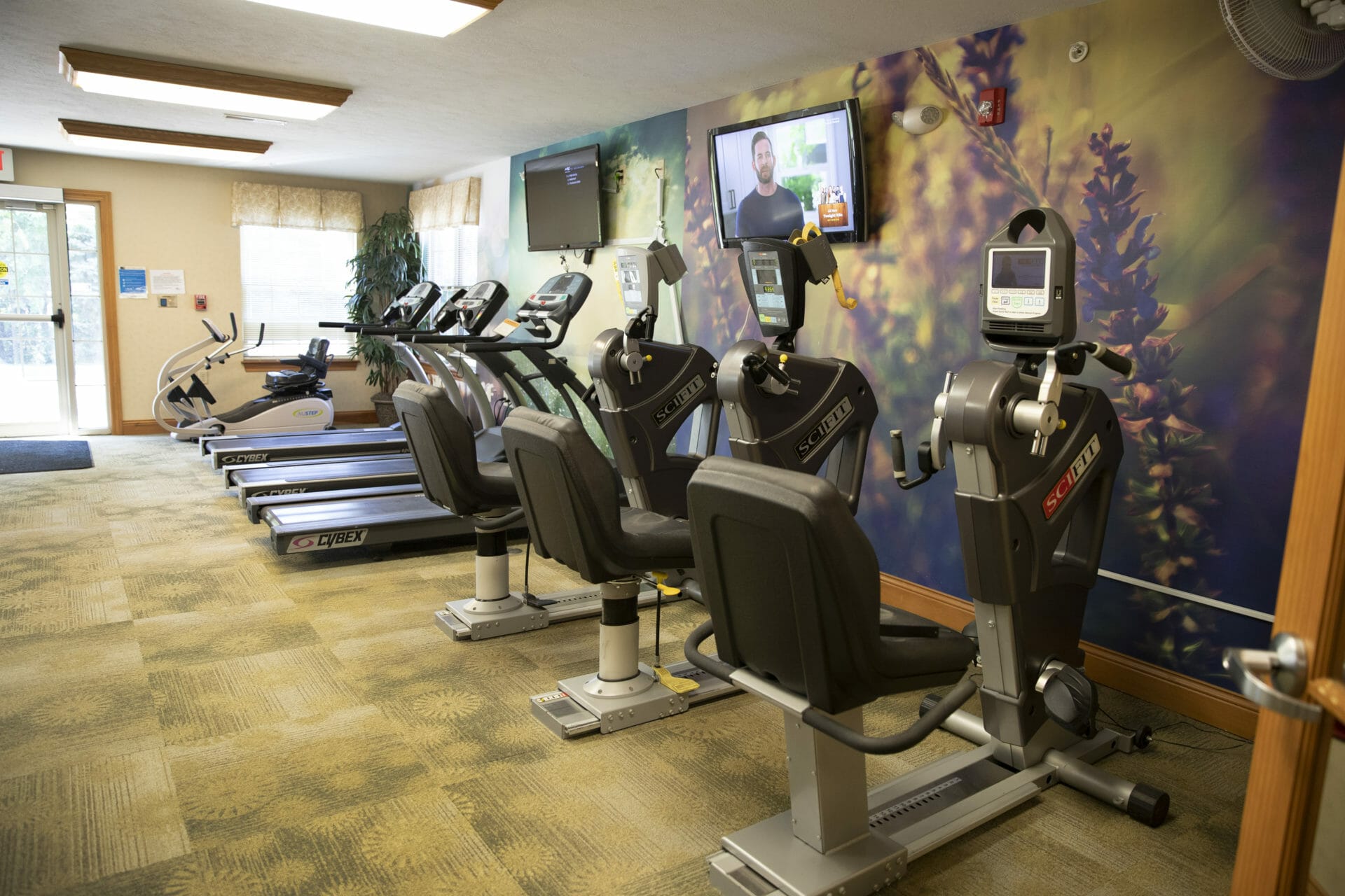 <span  class="uc_style_uc_tiles_grid_image_elementor_uc_items_attribute_title" style="color:#000000;">The wellness room has many pieces of exercise equipment. </span>