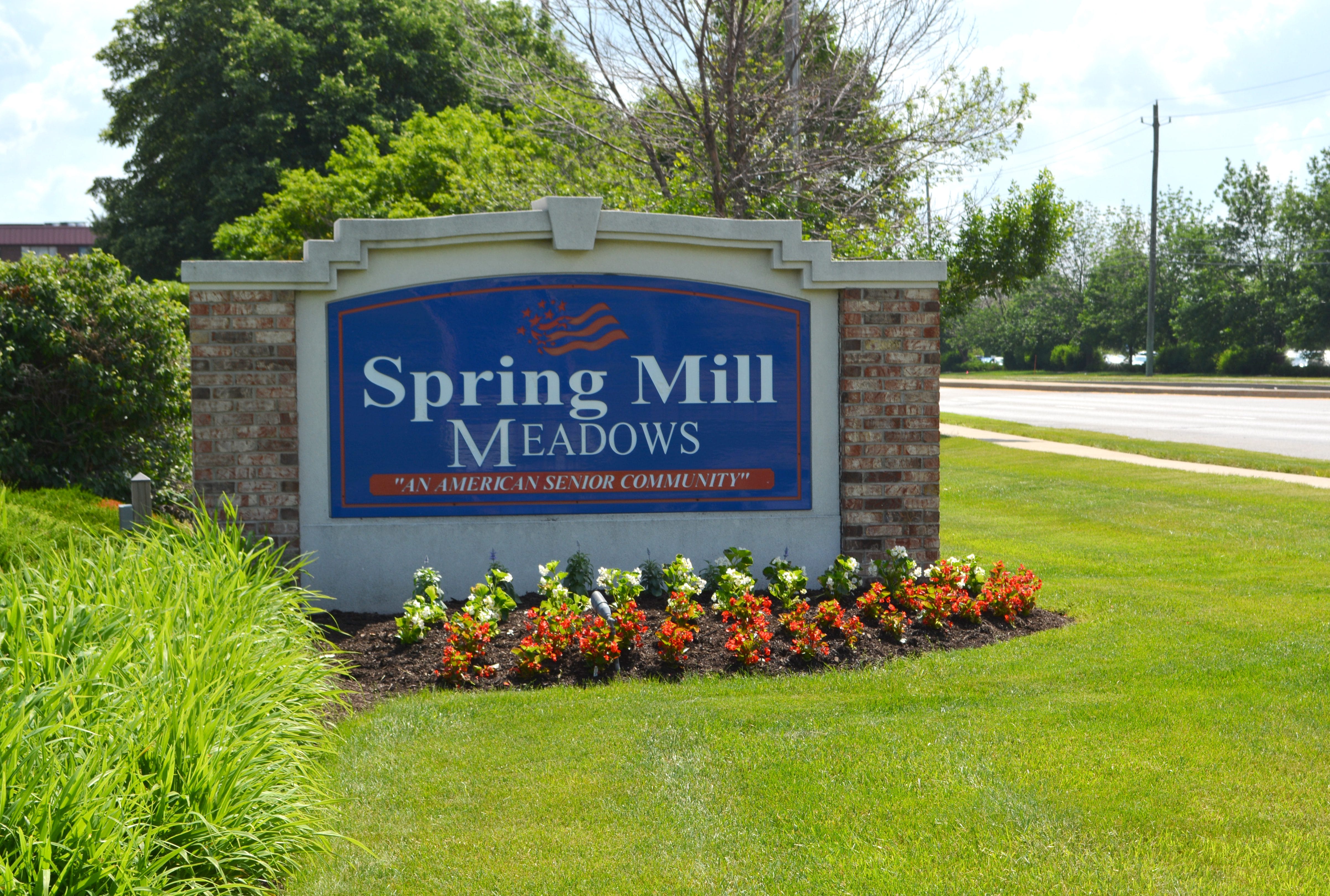 <span  class="uc_style_uc_tiles_grid_image_elementor_uc_items_attribute_title" style="color:#000000;">The Spring Mill Meadows entry sign</span>