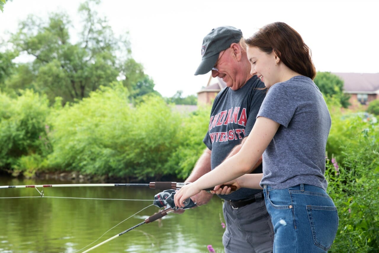 <span  class="uc_style_uc_tiles_grid_image_elementor_uc_items_attribute_title" style="color:#000000;">A resident and granddaughter are fishing. </span>