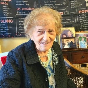 Centenarian Eileen Weber with backdrop of family photos and momentous events in 1922